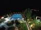 Ξενοδοχείο Marmari Bay Άποψη της πισίνας το βράδυ