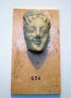 Akr 654. Head of a Kore or Sphinx