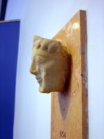 Akr 654. Head of a Kore or Sphinx