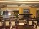 Archontikon Hotel: Lounge with fireplace and plasma TV set