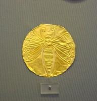 4. Gold roundels with repoussé motifs