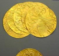 4. Gold roundels with repoussé motifs