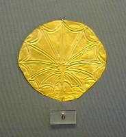 6. Gold roundels with repoussé motifs