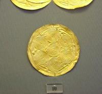 10. Gold roundels with repoussé motifs
