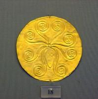 18. Gold roundels with repoussé motifs