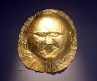 Athens National Archaeological Museum: Exhibit 623. Gold death-mask of a man; made of a gold sheet with repoussé details. The gold mask is the exclusive funerary apparel of Mycenaean males.