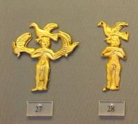 27-28. Gold cut-out in the shape of a female deity with birds. 