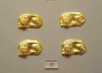 32. Lion figurines made of gold foil.