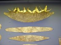 230. Gold diadem with applied floral plaques; 235, 286. Gold diadems with repoussé circles and rosettes. Grave IV.