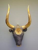 384. Silver rhyton in the shape of a bovine head with gold horns and rosette on the forehead.