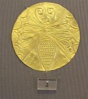 2. Gold roundels with repoussé motifs