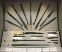 National Archaeological Museum: Gallery IV / Grave Circle A / Weapons and implements from Grave IV, Mycenae, 16th century BC. (General Photo of Window)