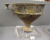 390. Silver goblet with applied gold representation of an altar with branches. Grave IV