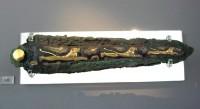 395. Bronze dagger with inlaid decoration, which depicts lions in flying gallop.