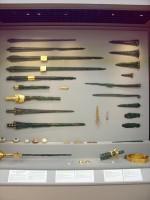 National Archaeological Museum: Gallery IV / Grave Circle A / Weapons and implements from Grave V, Mycenae, 16th century BC. (General Photo of Window)