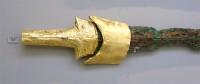 723. Type A bronze sword with gold revetment on the hilt and gold plaques from the wooden scabbard's revetment.