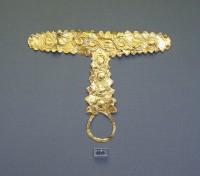 8559. Ornate gold plaque of the 