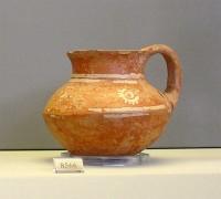 8566. Juglet of red clay with white decoration. Grave A