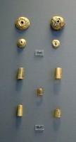8597, 8598. Gold cylinders and button revetments. Grave Nu