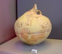 8601. Clay beak-spouted jug decorated with birds, imported from the Cyclades. Grave Nu