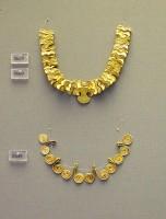 8649, 8659, 8660.  Gold necklaces, one with bird-shaped beads and a figure-of-eight shield in the center. Grave Omicron