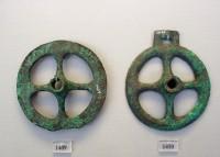 1409, 1410. Wheels from chariot models (from the Mycenae acropolis bronze hoards).