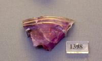 1398. Rim fragment from an amethyst Minoan ritual vessel in the shape of a triton shell. 15th century BC.