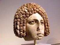 505. Female portrait head in the form of a mask. Pentelic marble. Unknown provenance. Late 1st c. AD.