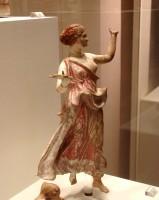 Gods in Color: 3. Clay figurine of Victory (Nike), holding a sea-shell. Myrina. 150-130 B.C. (no. 5101)