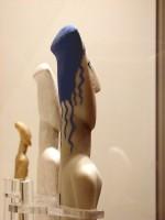 B. Cast of the marble figurine no. 252 with a hypothetical reconstruction of its polychrome decoration on its back side. Museum of Cycladic Art.