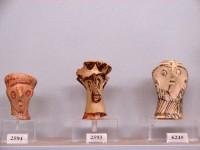 2593, 2594, 6245. Clay female figurines with raised arms (of the so called Psi type) and heads of female figurines and head of a bearded male figurine (6245).