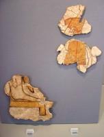 11635, 11636. Two fragments of a wall-painting depicting a seated goddess. 