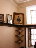 Kastoria Folklore Museum: Children Everyday Room, Shelf with photographs above the Craddle rocker