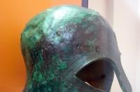 Votive bronze helmets