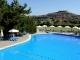 Delfinia Hotel & Bungalows Pool and View to Molyvos Castle