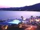 Poseidon Hotel-Apartments Pool and Beach at Night