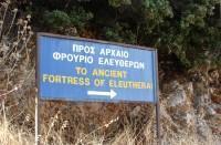 Eleutherai: This sign is found at the beginning of an uphill dirt road leading to the fortress