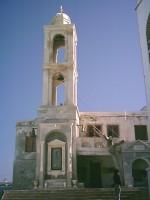 Marble Bell Tower housing in its base a holy Icon at The Holy Convent of Kechrovouni, Tinos