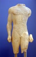 Akr 665.  Marble Statue of a Kouros (Front side)